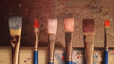 Verna Vogel paintbrushes after use red violet brown black white