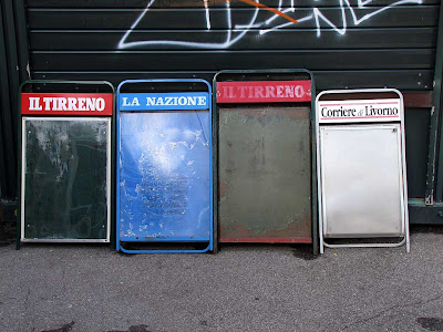 Empty newspaper billboards, Livorno