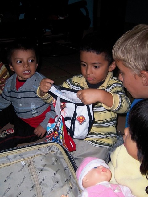 the kids and passed out shoes clothes socks and underwear to each 