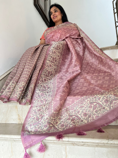 Lavender digital print contemporary tussar saree with a pichwai peacock border and pallu.