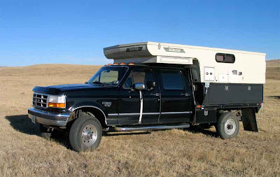 This is a fully customized camping and towing rig built on a Ford F350 Crew