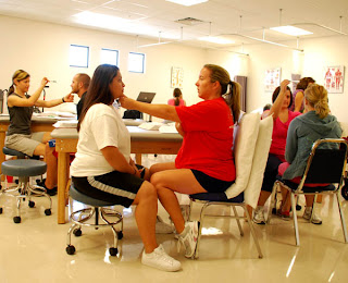 PTA students practice vestibular rehab evaluation techniques Aug. 27 in the PTA lab on the Lake Havasu City campus.