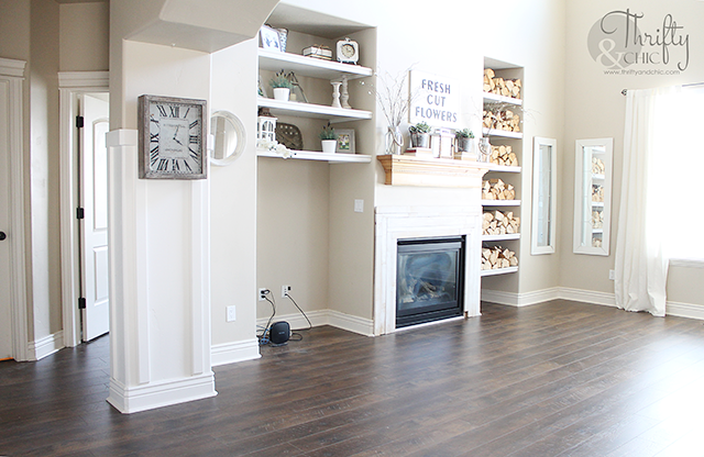 Why we chose laminate versus hard wood flooring. Plus, a glimpse into the installation process!