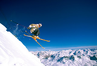 Skiing down a steep slope