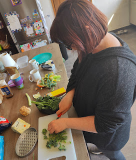 Angela making soup with produce from the garden