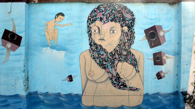 piguan graffiti arte callejero en la calle exposición, santiago de chile