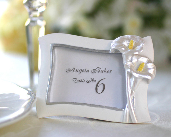 Place card holders are wonderful because they can serve as a favor as well