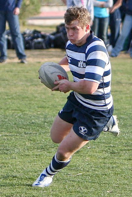 BYU Rugby Flyhalf Dylan Lubbe surveys the field for open space