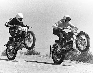 Here's something really amazing we came across. Video footage of the International (motorcycle) Road Race, in Indiana around 1919. This is a newsreel of the motorcycle road race featuring three of the leading brands of bikes: Harley-Davidson, Excelsior, and Indian. Features some notable bikers of day including Otto Walker, Teddy Carroll, Red Parkhurst, and Ralph Hepburn. Walter Davidson, president of H-D, appears at the end! This race was filmed in Marion, In. 46952 back in 1919. It's rumored that in 1920 a Harley Racer won and the winner was given a baby hog to do the victory lap with. That is where the term "HOG" was said to have been born on the day in Sept,1920.