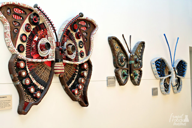 The Michelle Stizlein moths industrial art exhibit at COSI- Each giant breathtaking moth is constructed from 100% recycled materials.