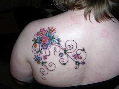 flower tattoos on shoulder. Nice Looking Flower Tattoo