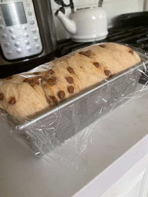 Cinnamon bread dough rising in pan