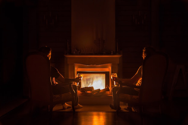 Interior stone fireplace refacing. Photo by Sergei Solo on Unsplash.