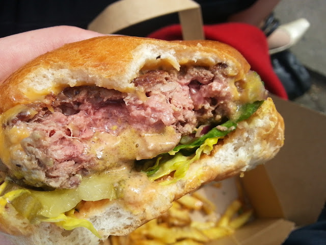The Honest Burger American cheeseburger bite-through