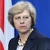 British PM under fresh pressure as top aides quit