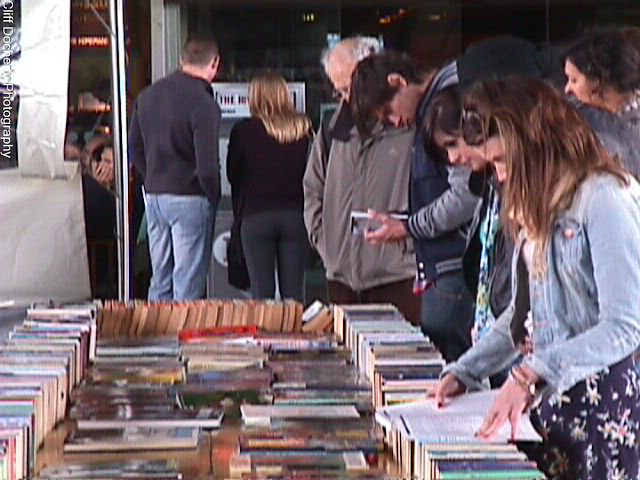 Early digital photo of people browsing the book market on London's South Bank
