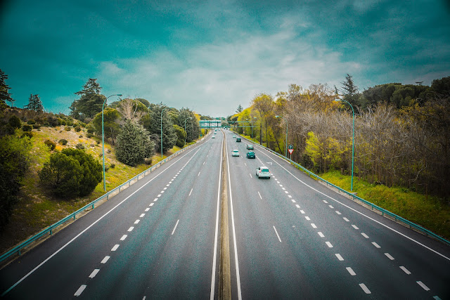 Photo by Iván Rivero: https://www.pexels.com/photo/aerial-photo-of-asphalt-road-1046227/