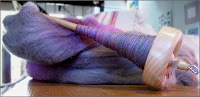 Moonstone roving on spindle