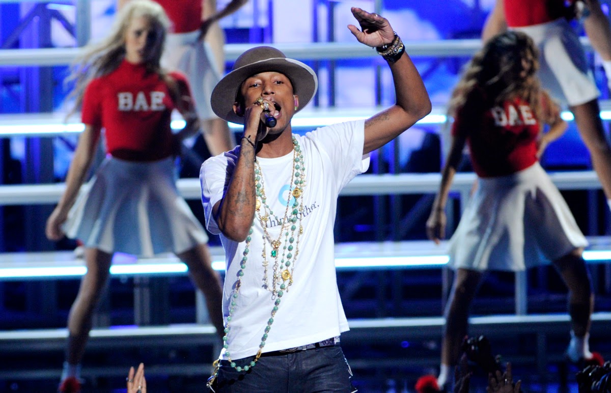 Pharrell, Host Chris Rock Kick Off BET Awards