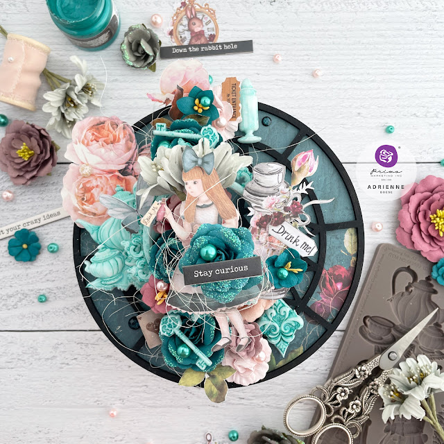 Mixed media panel created with papers, ephemera, flowers and moulds from the Lost in Wonderland collection from Prima Marketing; plus Finnabair moulds, paint and mediums.