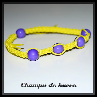 Pulsera amarilla perlas moradas