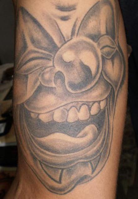 3d black and gray clown tattoo