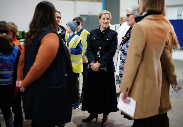 Sophie, Duchess of Edinburg wore a logo buckle belted wool jacket by Bally for visit to Yeo Valley Farm and Organic Garden