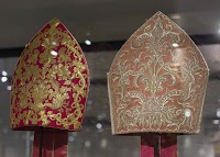 Exceptions from the Rule: Coloured Mitres