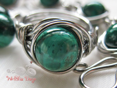 Twice Around the World (TAW) wire wrapped ring with Malachite