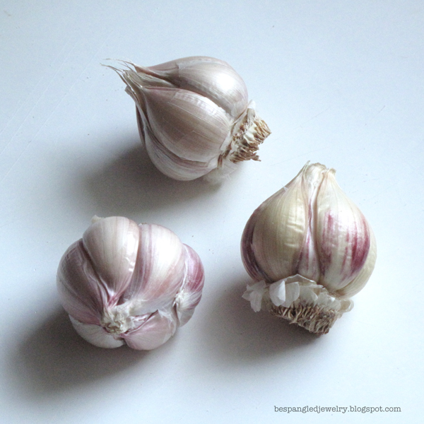 Step 1: peel off the outer layers of paper until you see the individual cloves of garlic