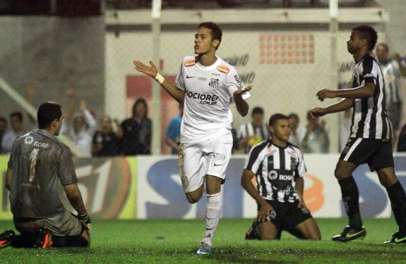 Santos star Neymar celebrates after scoring one of his four goals against União Barbarense