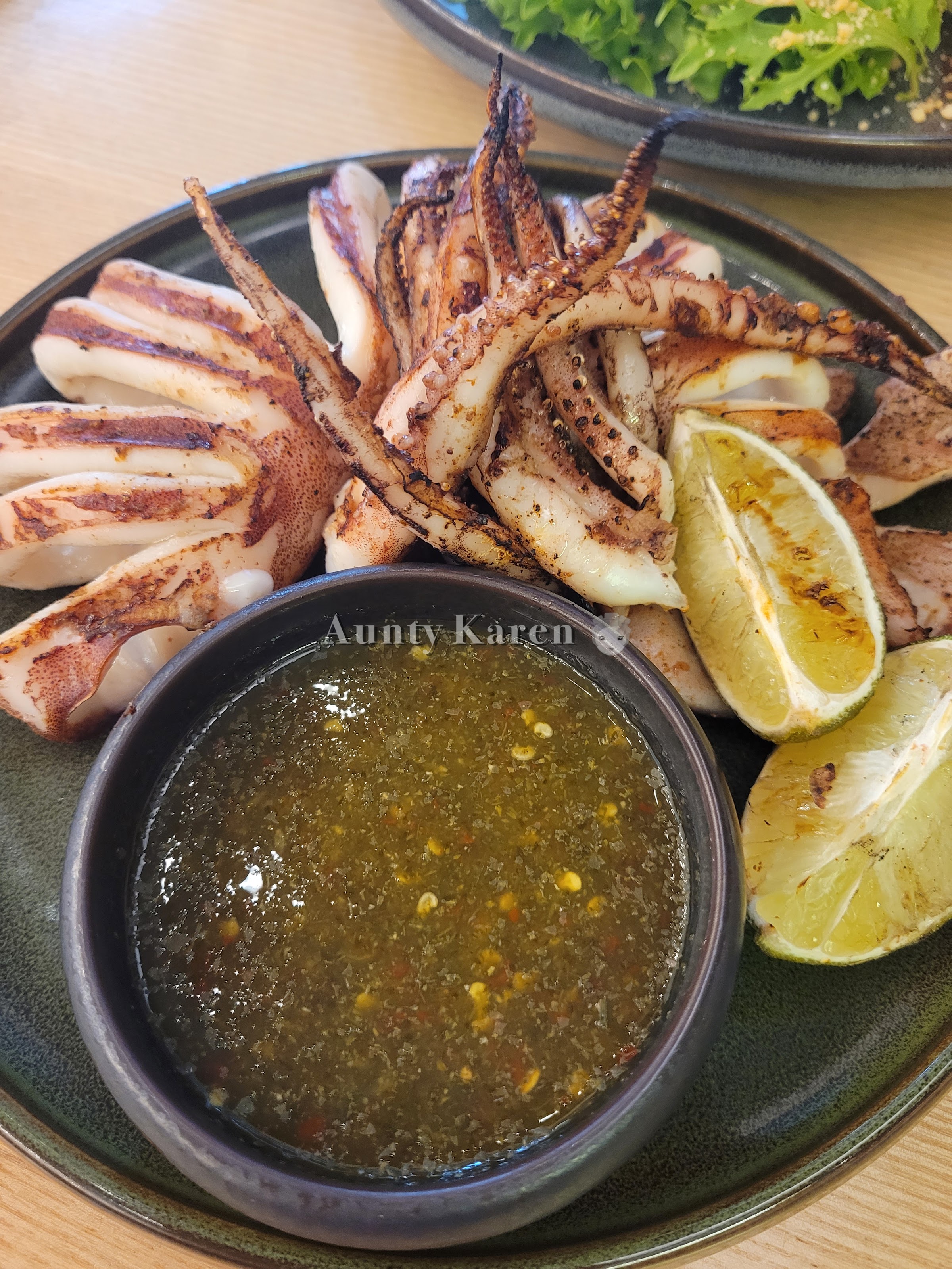 Close-up of a plate of Grilled Ika Squid