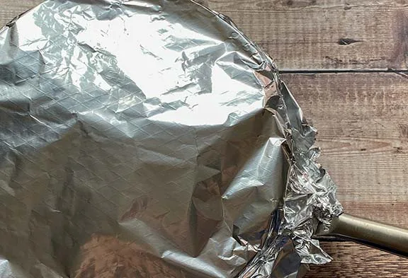 Cover the pan with foil.