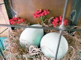 A few sprigs of red give this spring arrangement a pop of color via http:///deniseonawhim.blogspot.com