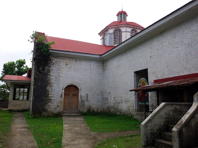 external left side view of Sto Nino De Malitbog or Holy Child of Malitbog Parish Church