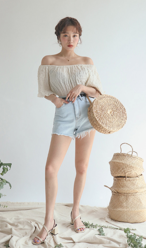 Light Wash Fringed Cutoff Shorts