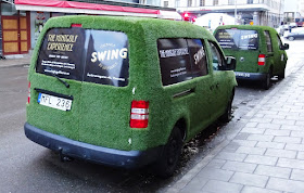 The Swing by Golfbaren vans outside the indoor minigolf course and speakeasy in Stockholm Sweden