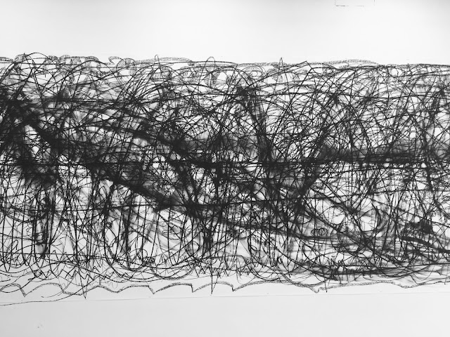 User Black and white photograph by Agnes Prygiel captures M. Lohrum's exhibition preview in London. Convoluted black lines form a powerful expressive drawing