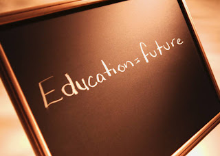 Educator=future written on a chalkboard.
