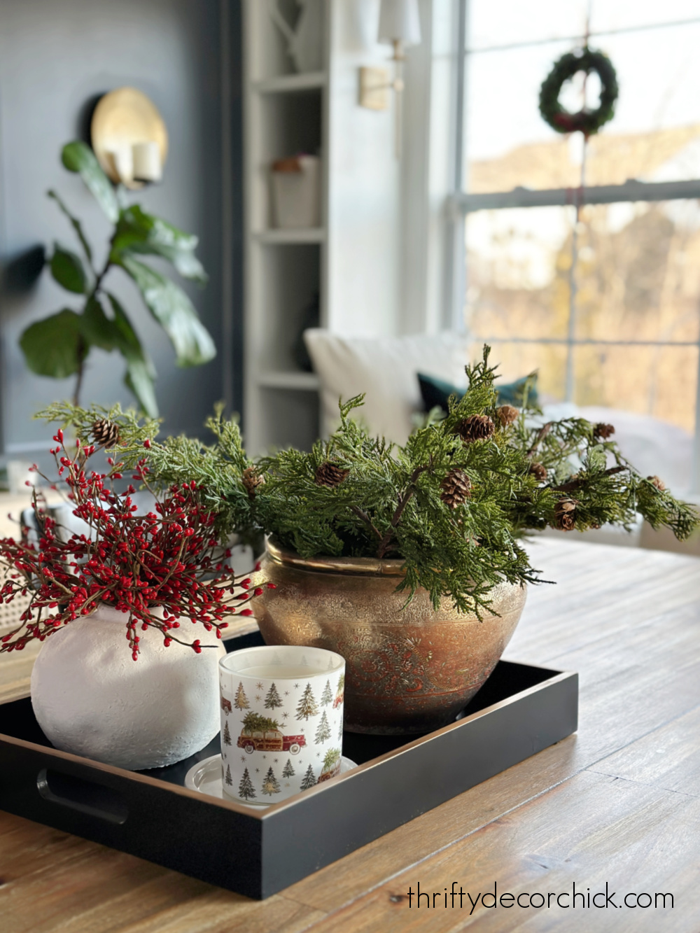tray on table with Christmas greenery