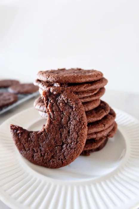 stacked chocolate wafer cookies on a plate