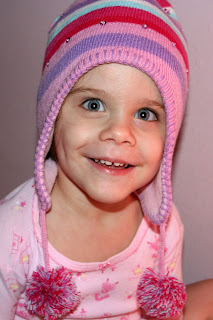 My daughter Kaitlyn wearing her winter hat from Wales UK