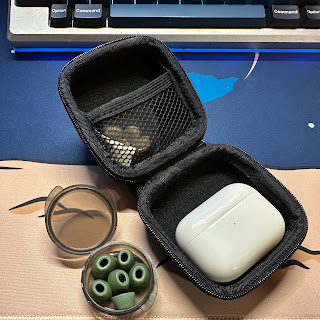 AirPods Pro in UGREEN case, showing pill organizer with spare tips