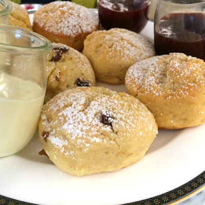 The Langham | Homemade raisen and vanilla scones with cream and strawberry jam