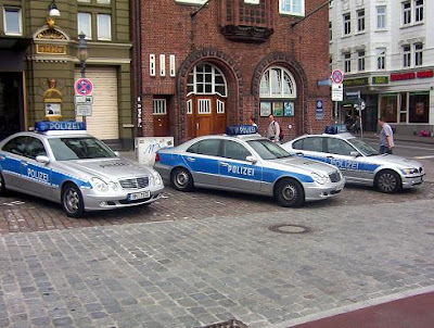  where the standard police cruiser is a brand new Mercedes Eclass sedan