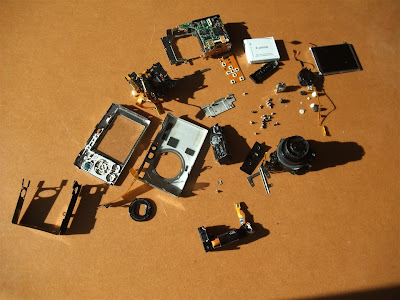 disassembled SD770is canon camera, all pieces, parts