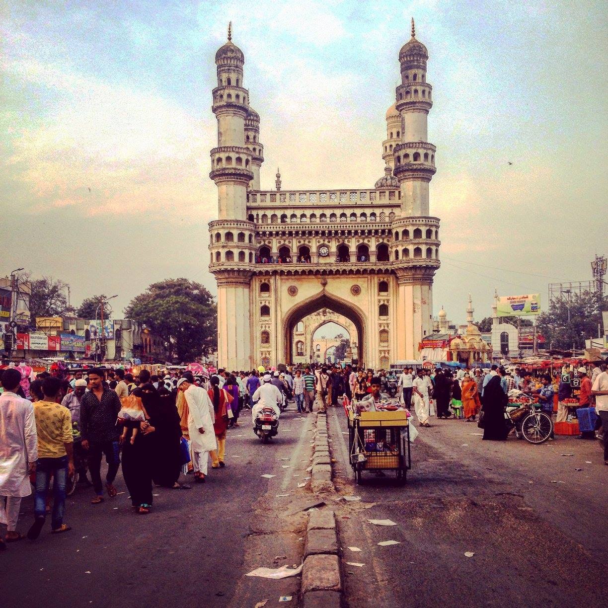 charminar in the centre of a road hyderabad, it'a one of the most beautiful temples in india