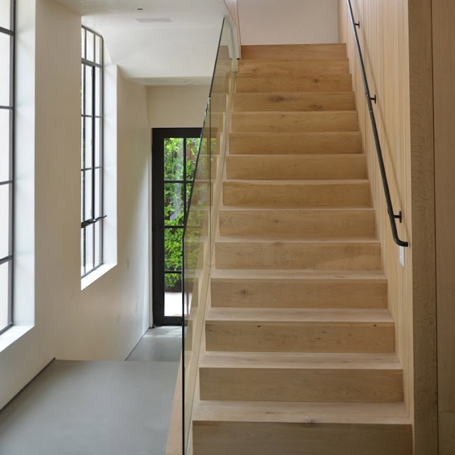 Gorgeous wood modern minimal staircase with glass in Cliff House by Giannetti home