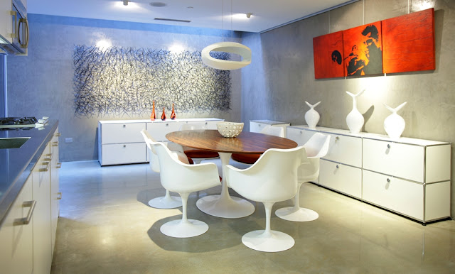 Picture of modern dining room and the kitchen in the cliff house