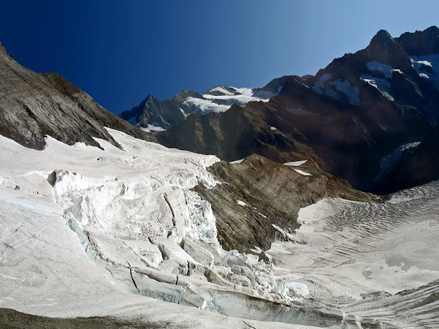 blanket of snow on the swiss alps